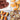 A collage showcases the Madeleines & Tea Cake Masterclass: chocolate swirl cookies on a plate, golden French madeleines on marble, rectangular tea cakes cooling, and marbled pound cake slices.
